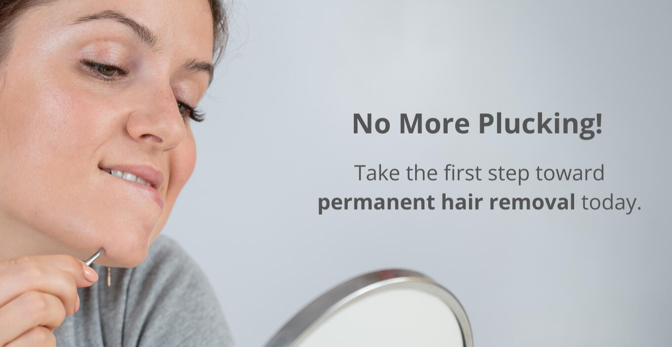 Woman plucking hairs from chin